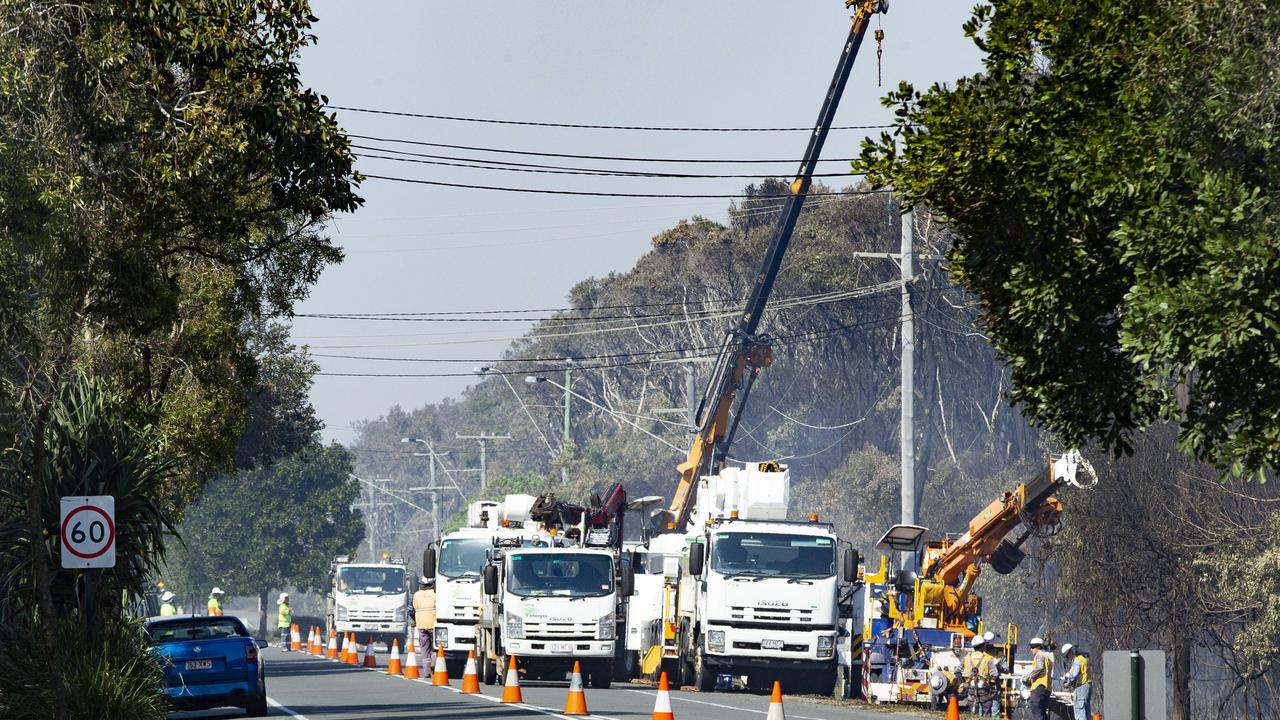 Crews work to keep the power on. Picture: Lachie Millard