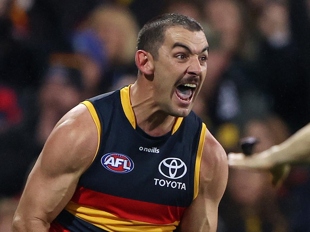 ADELAIDE, AUSTRALIA - AUGUST 19: Taylor Walker of the Crows celebrates a goal during the 2023 AFL Round 23 match between the Adelaide Crows and the Sydney Swans at Adelaide Oval on August 19, 2023 in Adelaide, Australia. (Photo by Sarah Reed/AFL Photos via Getty Images)