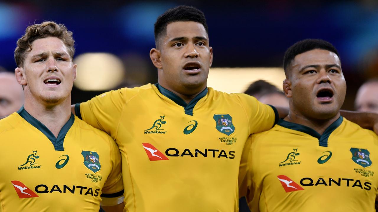 Michael Hooper, Scott Sio and Tolu Latu of Australia sing the national anthem.