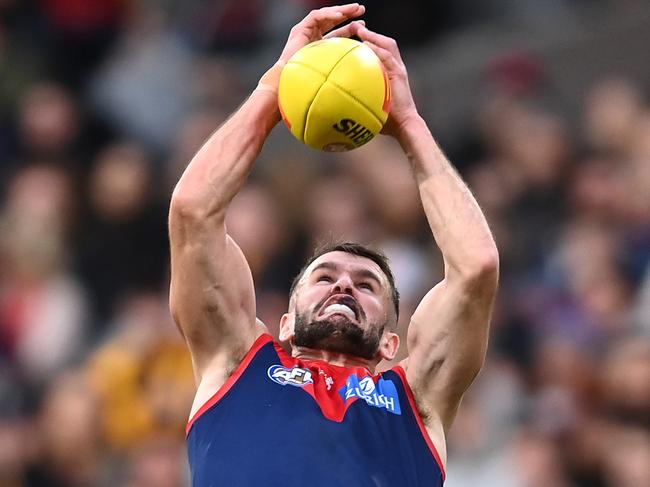 MELBOURNE, AUSTRALIA - APRIL 30: Joel Smith of the Demons marks during the round seven AFL match between the Melbourne Demons and the Hawthorn Hawks at Melbourne Cricket Ground on April 30, 2022 in Melbourne, Australia. (Photo by Quinn Rooney/Getty Images)