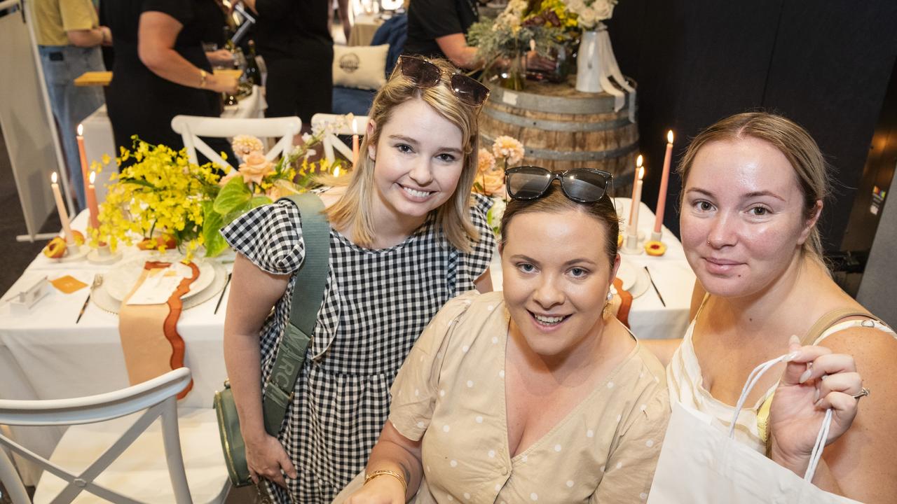 Bride-to-be Verity Campbell (centre) with her bridesmaids Malinda Southwell (left) and Rikki-Lee Truscott at Toowoomba's Wedding Expo hosted by Highfields Cultural Centre, Sunday, January 21, 2024. Picture: Kevin Farmer