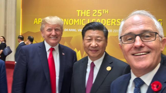 Australian Prime Minister Malcolm Turnbull takes a selfie with US President Donald Trump and President Xi at APEC. Picture: @TurnbullMalcolm/Twitter