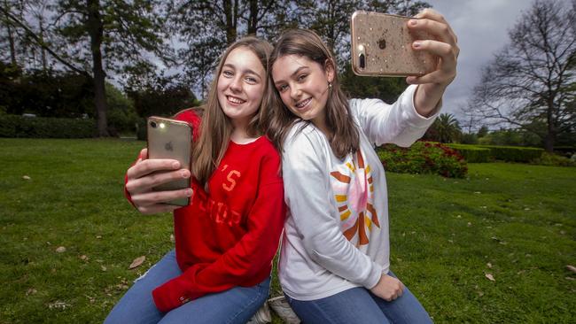 Melbourne teenagers Lucy and Amelie both have social media accounts. Picture: Wayne Taylor