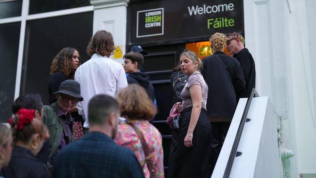 Members of the Irish community come together to mourn singer Sinead O'Connor. The funeral will be held for her in Ireland on Tuesday. Picture: Carl Court/Getty Images