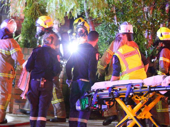 Paramedics at the scene of the fire. Picture: Patrick Herve