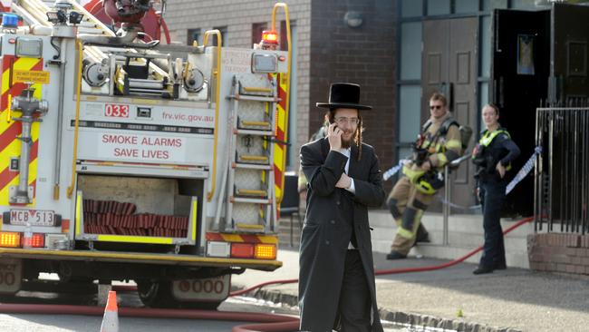 Police and fire crews outside the Ripponlea synagogue on Friday. Picture: NewsWire / Andrew Henshaw