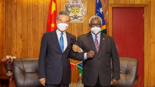 Solomon Islands Prime Minister Manasseh Sogavare (right) meets with visiting Chinese State Councilor and Foreign Minister Wang Yi in Honiara, Solomon Islands, in May. Picture: Getty Images