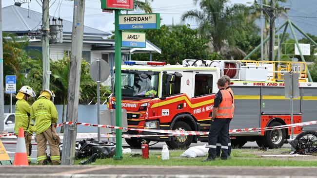 Emergency personnel including firefighters attended a serious accident between a car and motorbike on the corner of Sheridan and James Street on Thursday afternoon. Picture: Emily Barker