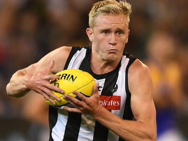 Jaidyn Stephenson of the Magpies is seen in action during the Round 3 AFL match between the Collingwood Magpies and the West Coast Eagles at the MCG in Melbourne, Saturday, April 6, 2019. (AAP Image/Julian Smith) NO ARCHIVING, EDITORIAL USE ONLY