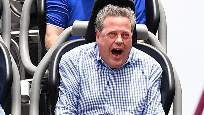 Queensland Opposition Leader Tim Nicholls (bottom right) takes a ride on the DC Rivals Hypercoaster at the Movie World theme park on the Gold Coast, Thursday, November 9, 2017. Mr Nicholls announced that the LNP, if elected, will invest $100 million to improve M1 ramps to reduce congestion. (AAP Image/Dan Peled) NO ARCHIVING