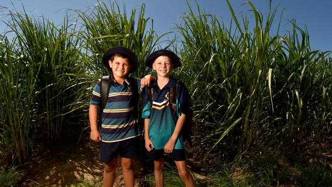 Clare State School. Flynn Kovacich, 8, and Jace Bethel, 11, at cane fields next to the school. Picture: Evan Morgan