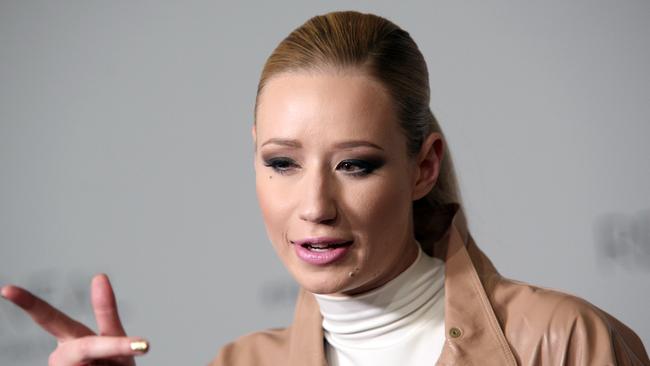 Iggy Azalea Disgusting Captions - Australian rapper Iggy Azalea denies she's the buxom blonde in a raunchy  sex tape doing the rounds | news.com.au â€” Australia's leading news site