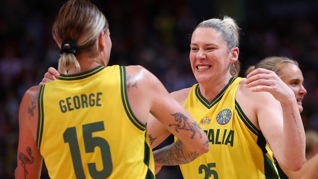 Lauren Jackson of Australia and Cayla George celebrate the Opals’ win over Serbia. (Photo by Kelly Defina/Getty Images)