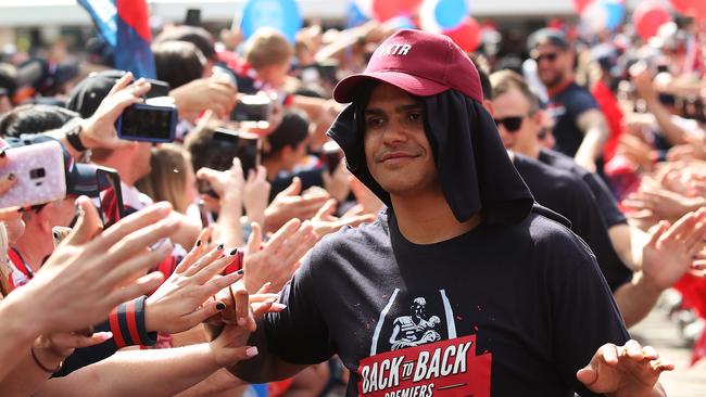 Latrell Mitchell greets the fans. Picture: Brett Costello