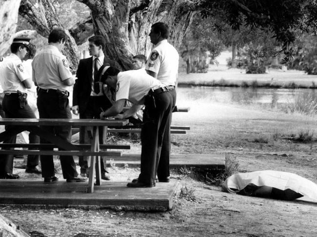 Police officers after the discovery of murder victim Sallie-Anne Huckstepp in Centennial Park, in Sydney in February, 1986.