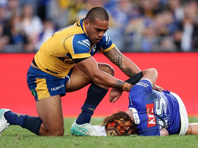 SYDNEY, AUSTRALIA - JUNE 10: Joe Ofahengaue of the Eels checks on Josh Curran of the Bulldogs during the round 14 NRL match between Canterbury Bulldogs and Parramatta Eels at Accor Stadium, on June 10, 2024, in Sydney, Australia. (Photo by Brendon Thorne/Getty Images)