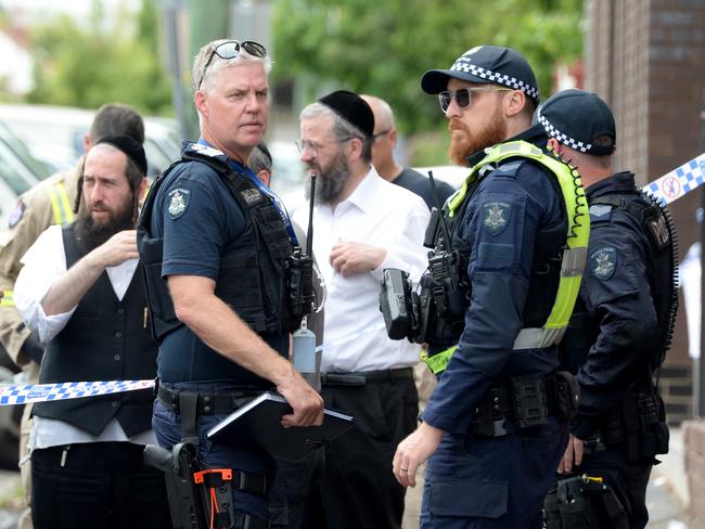 Police and fire investigators outside the Addass Israel synagogue at Ripponlea. Picture: Andrew Henshaw