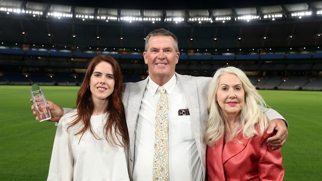 Farmer of the Year 2024 sheep category winner Nigel Kerin and daughter, Georgia, left, and wife Kate at the MCG.