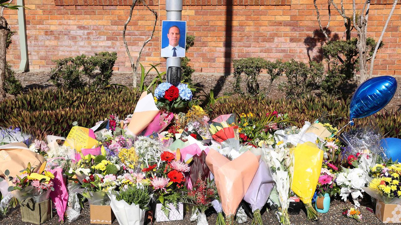 Flowers and messages left for David Masters at Deception Bay Police Station. Picture: Liam Kidston