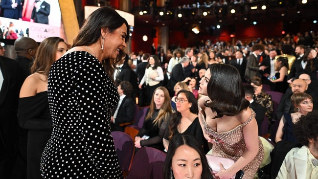 Karla greeting Selena Gomez at the 2025 Oscars after ‘rich rat’ comment. Picture: AFP