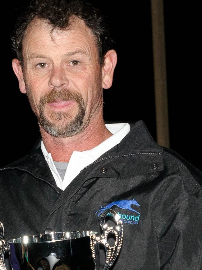 Greyhound trainer Tony Rasmussen and his wife Lisa have been charged with a dozen offences over shocking footage showing dogs in their care being kicked and flung around. Picture: Greyhound Racing SA