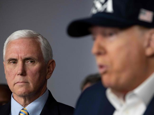 US President Donald Trump speaks as US Vice-President Mike Pence listens during a press briefing about coronavirus (COVID-19) alongside members of the Coronavirus Task Force. Picture: AFP