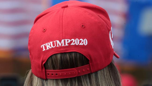 A supporter listens as Vice President Mike Pence speaks during a campaign rally. Picture: Scott Olson/Getty Images/AFP