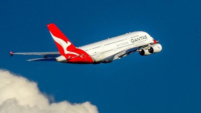 A Qantas Airbus A380-842, registration VH-OQK, has taken off to the west from Sydney Kingsford-Smith Airport and climbing above the clouds.  She is heading to Singapore as flight QF1.  This image was taken from Nigel Love Bridge off Airport Drive, Mascot on a sunny and windy afternoon on 8 April 2023.Escape 16 June 2024Why I TravelPhoto - iStock