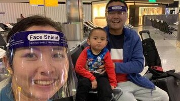 Ha Phung and Vu Nyuen and their son Sam, 3, landed at Melbourne Airport on Monday.