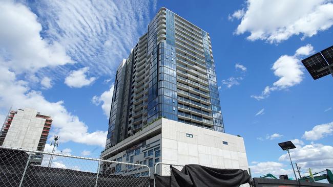 MELBOURNE AUSTRALIA - NewsWire Photos DECEMBER 28, 2024: Photo of Liberty 1 building in Footscray with diggers in the front where Liberty 2 was to be built. Homes under construction hang in balance as Bensons Property Group enters administration, Picture: NewsWire / Luis Enrique Ascui