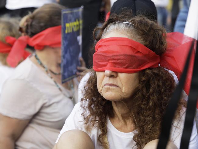 Family and friends of hostages taken from Kfar Aza demonstrate in Tel Aviv museum plaza in Israel. Picture: Getty Images