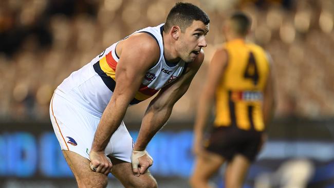 Crows skipper Taylor Walker reacts after Hawthorn kick another goal at the MCG on Saturday night. Picture: AAP Image/Julian Smith