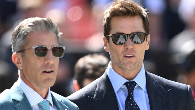 CLEVELAND, OHIO - SEPTEMBER 08: Broadcasters Kevin Burkhardt (L) and Tom Brady (R) walk along the field before the game between the Dallas Cowboys and Cleveland Browns at Cleveland Browns Stadium on September 08, 2024 in Cleveland, Ohio. (Photo by Nick Cammett/Getty Images)