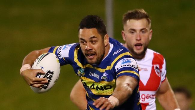 WOLLONGONG, AUSTRALIA — JUNE 28: Jarryd Hayne of the Eels is tackled during the round 16 NRL match between the St George Illawarra Dragons and the Parramatta Eels at WIN Stadium on June 28, 2018 in Wollongong, Australia. (Photo by Cameron Spencer/Getty Images)