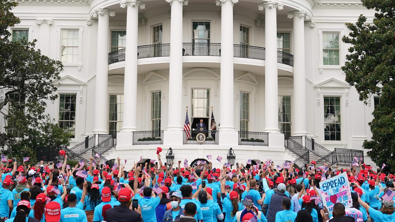 Supporters packed in closely together to cheer the President. Picture: Mandel Ngan/AFP