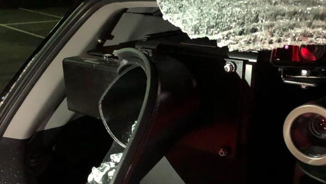 A smashed window on a mobile speed camera vehicle.