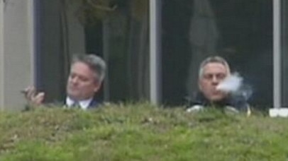 Then Treasurer Joe Hockey and Finance Minister Mathias Cormann pictured smoking cigars before delivering the first Abbott Budget on May 9, 2014.