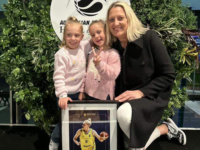 Hall of Fame Inductee Suzy Batkovic with twins Charli Ryder (left) and Layla Ryder.