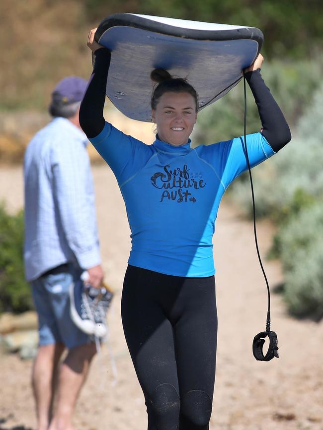 Marinoff with a surf board at Middleton Beach in November during a Crows’ pre-season team bonding experience. Picture: Dear Martin