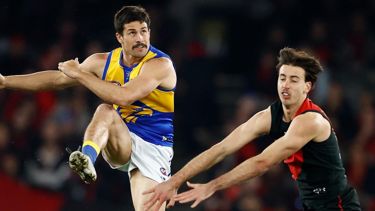 Nic Martin tries to smother a Liam Duggan kick. Picture: Michael Willson/AFL Photos via Getty Images