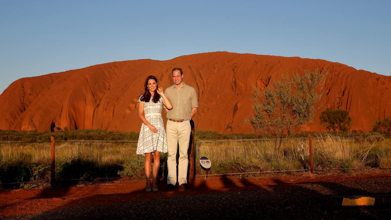 Prince William and Princess Kate watch on as the sunsets on Uluru. Picture: Gregg Porteous