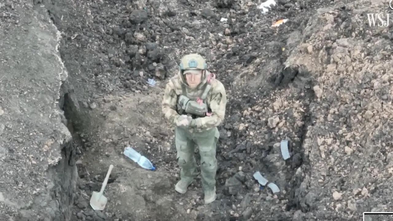 A Russian soldier desperate to survive after Ukrainian drones took out his entire unit used hand signals to surrender. Picture: WSJ / Ukraine 92nd Mechanized Brigade