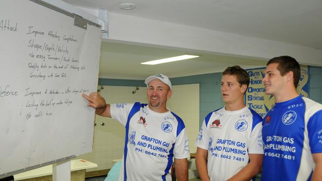 MASTER CLASS: Ghosts first grade coach Col Speed spends a light-hearted moment with players Daniel Lollback and Oliver Percy before their clash with Cudgen on Saturday. Photo: Gary Nichols/The Daily Examiner