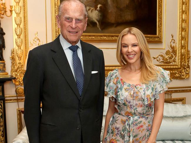 Prince Philip recently met with Kylie Minogue to present her with the Britain-Australia Society Award. Picture: Steve Parsons — WPA Pool/Getty Images.