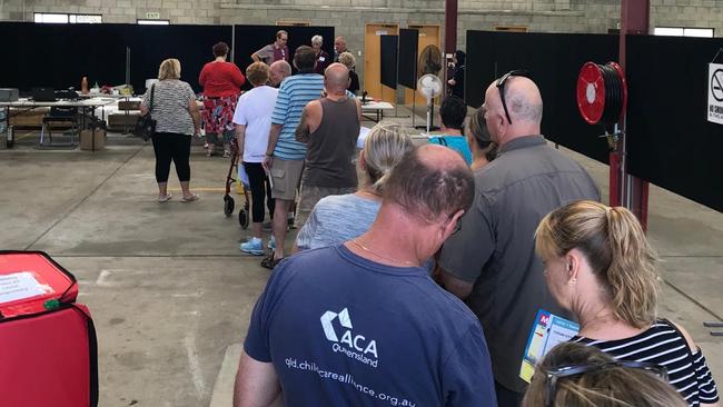 Voters lining up at the Slacks Creek voting booth. Candidates are concerned about the spread of the coronavirus.