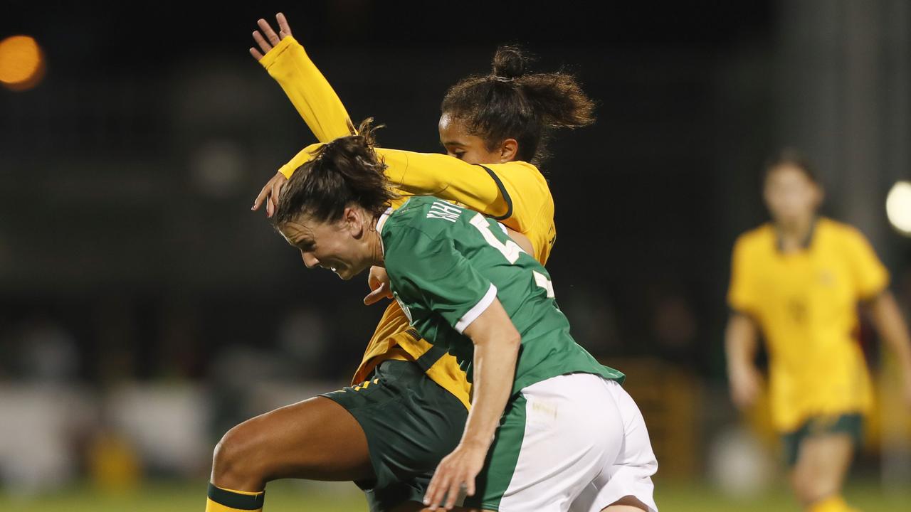 Mary Fowler battling Ireland’s Niamh Fahey at Tallaght Stadium.