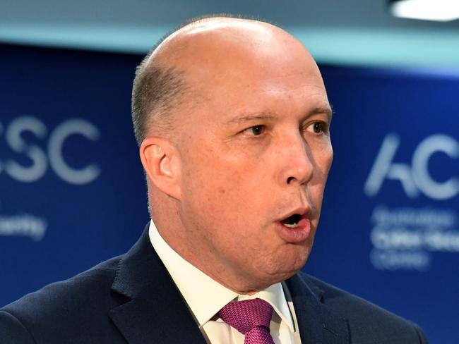 Minister for Home Affairs Peter Dutton at the opening of the Australian Cyber Security Centre at the Brindabella Business Park in Canberra, Thursday, August 16, 2018. (AAP Image/Mick Tsikas) NO ARCHIVING