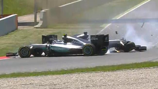 Disaster for Mercedes as Hamilton, Rosberg collide on Lap 1.