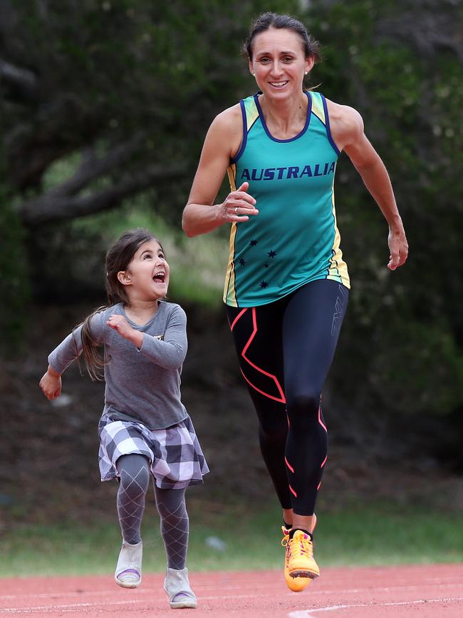 Little Maria is mighty proud of her Anna Kasapis, who has been named the Hume Leader Senior Sports Star for 2017. Picture: George Salpigtidis