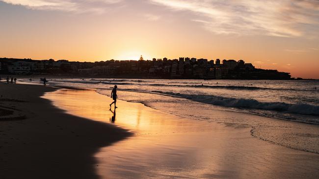 SYDNEY, AUSTRALIA - ÃNewsWire Photos April 15 Ã2021 People are seen at sunrise at Bondi BeachPicture: NCA NewsWire/Flavio Brancaleone